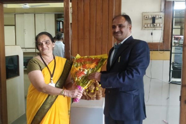 Floral Welcome Offered to Dr. Vrajesh Patel Principal SPTMC